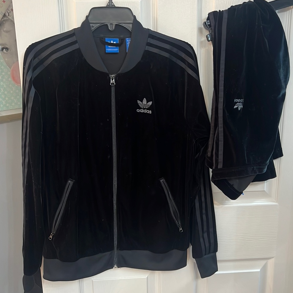 Woman’s addidas black velour tracksuit